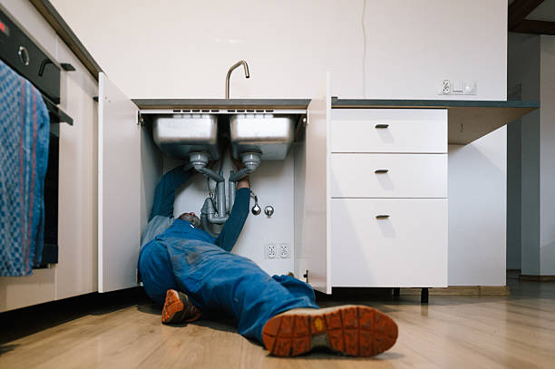 Professional Drain Cleaning technician working in Rochester, NY